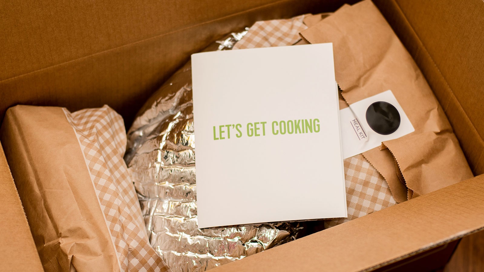 Smiling Waiter Smiling waiter holding tray with burger and fries