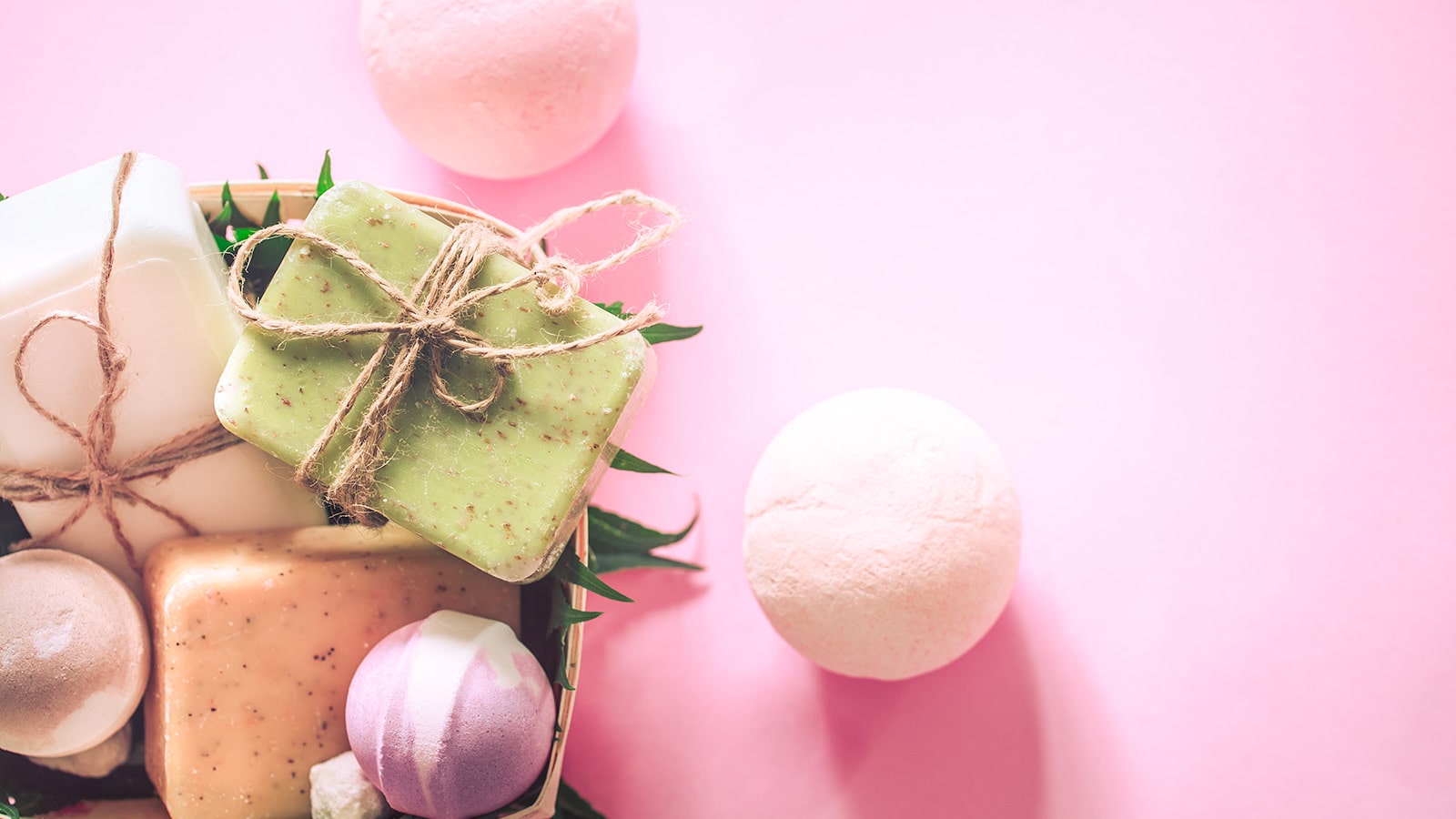 Salt Bombs Spa composition soap salt bombs on pink background