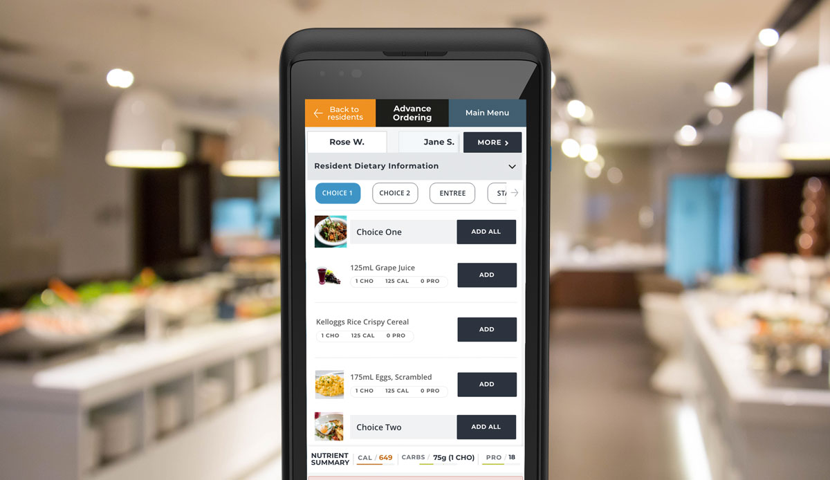 Pro Mobile Handheld MealSuite software shown on pro mobile handheld device with blurred image