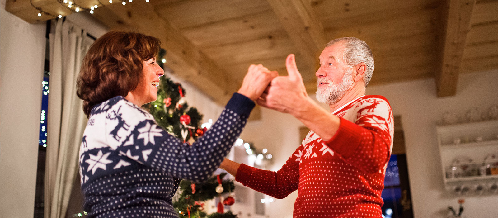 Couple Dancing Couple dancing by Christmas tree